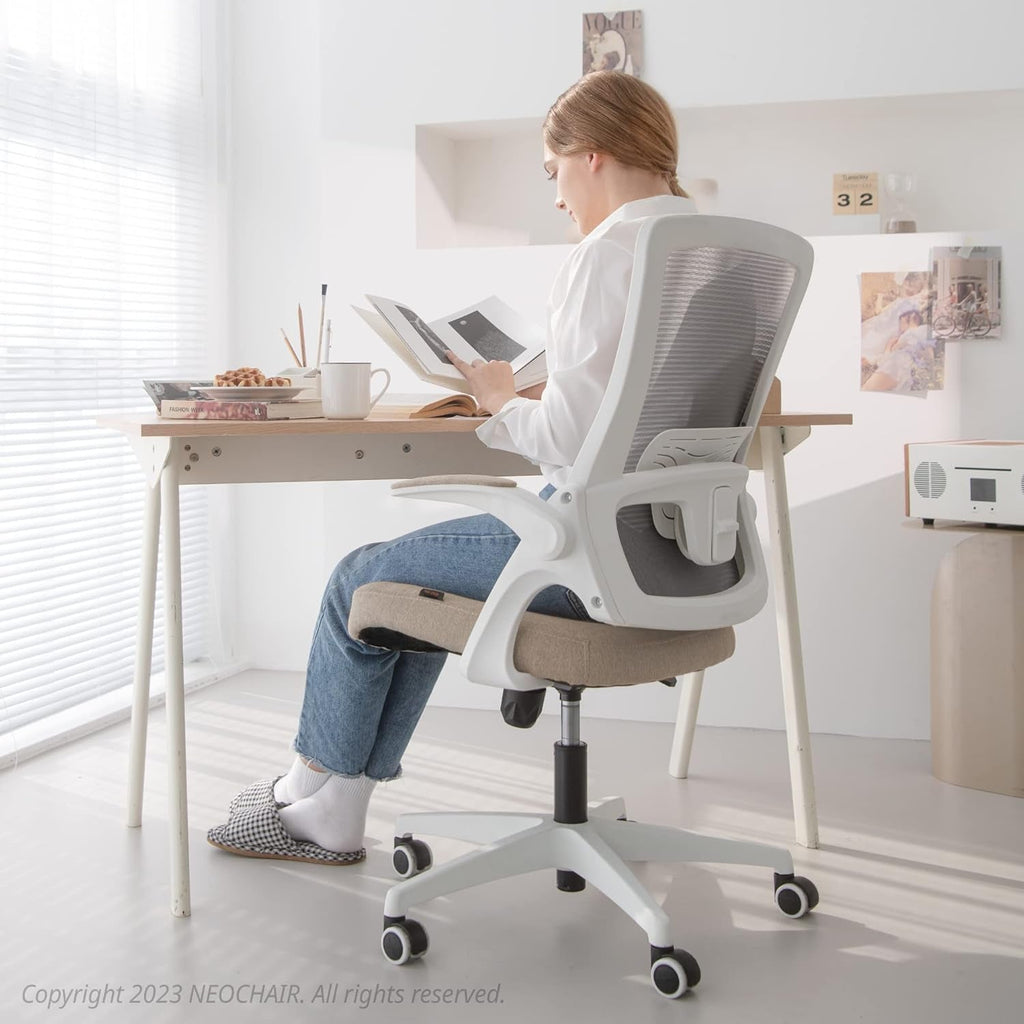 Beige Mesh Office Chair With Adjustable Height And Ergonomic Design