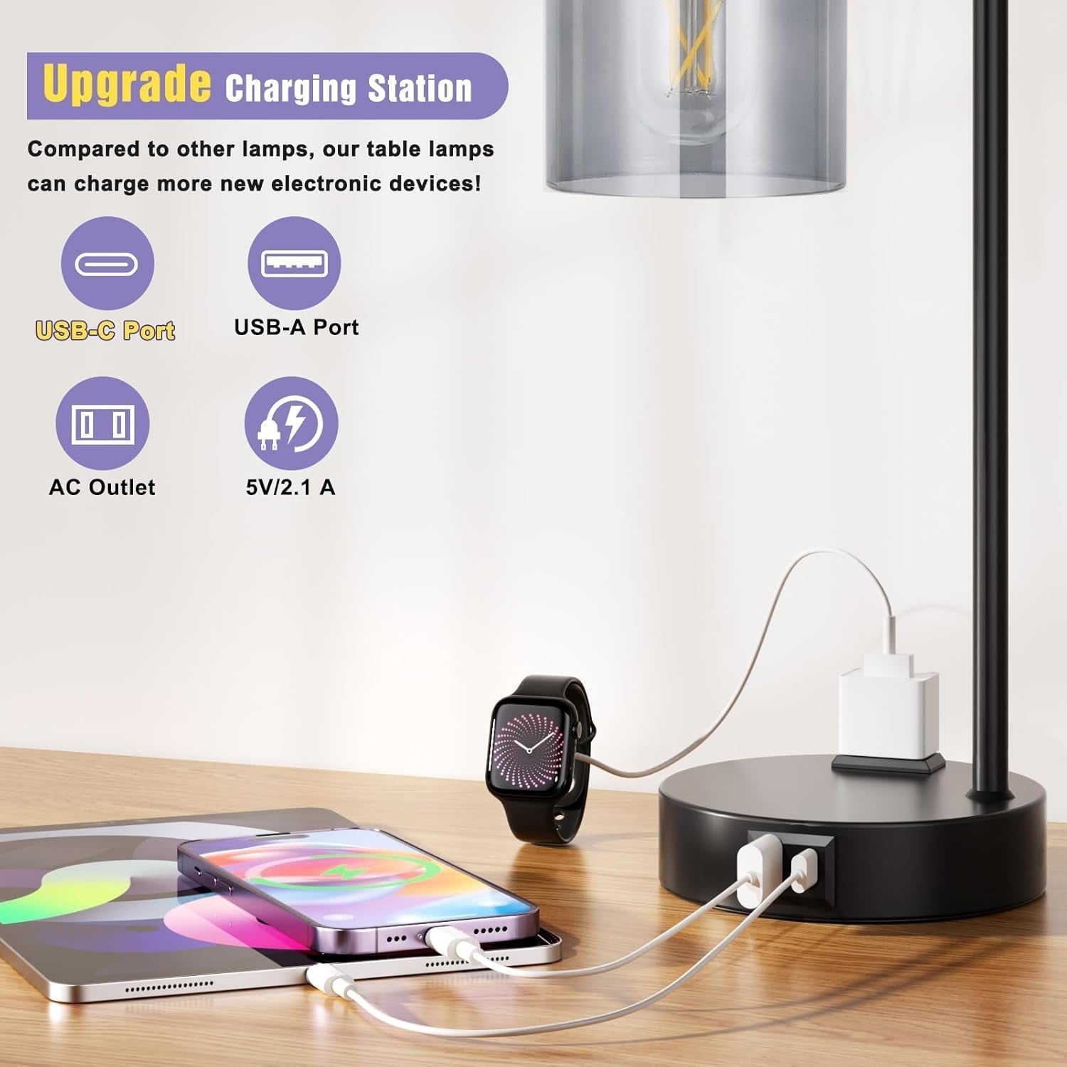 Table lamp with multiple charging ports on a desk, including USB-C, USB-A, AC outlet, and smartphone charging.