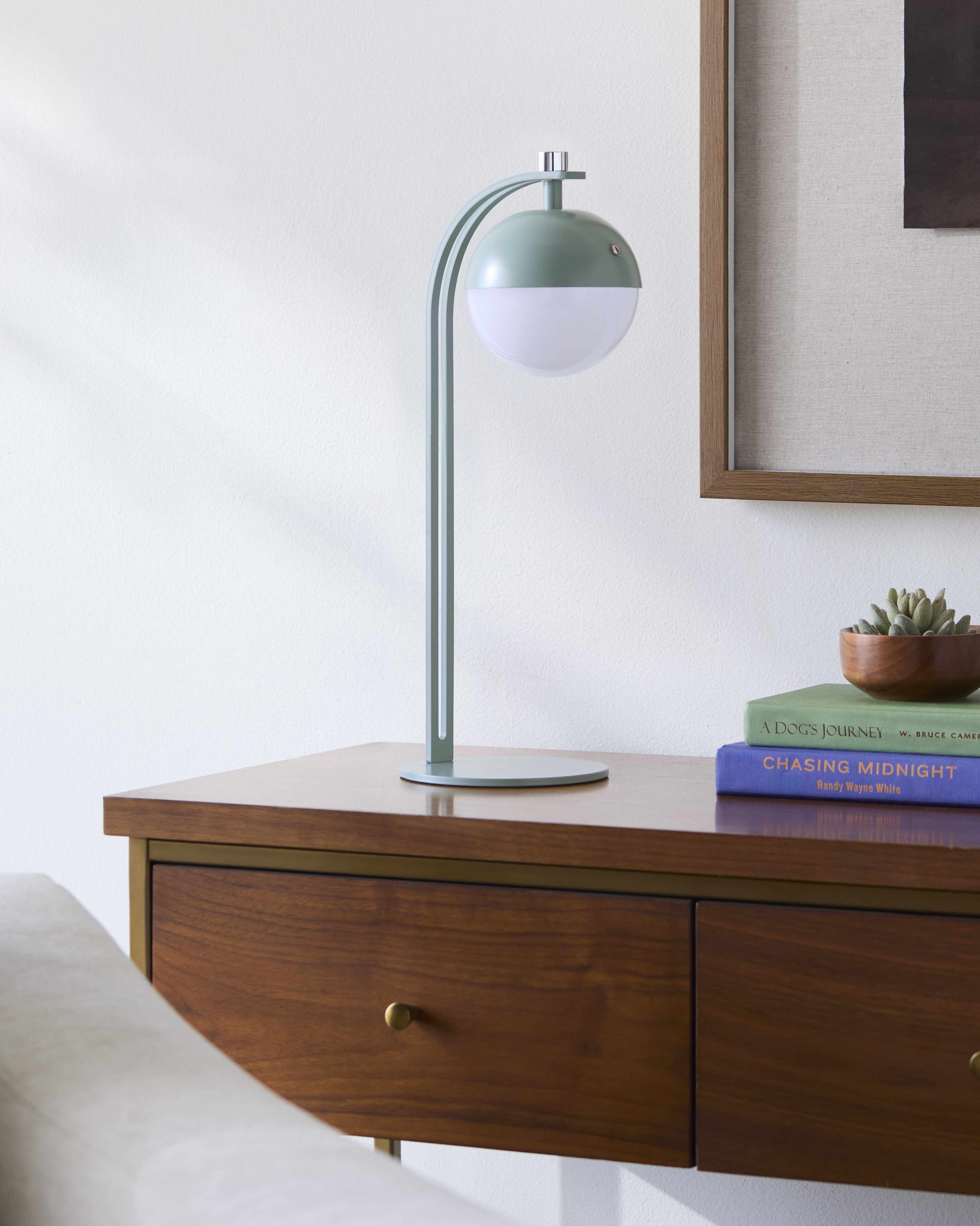 Accent lamp adding soft ambient light to home decor setting