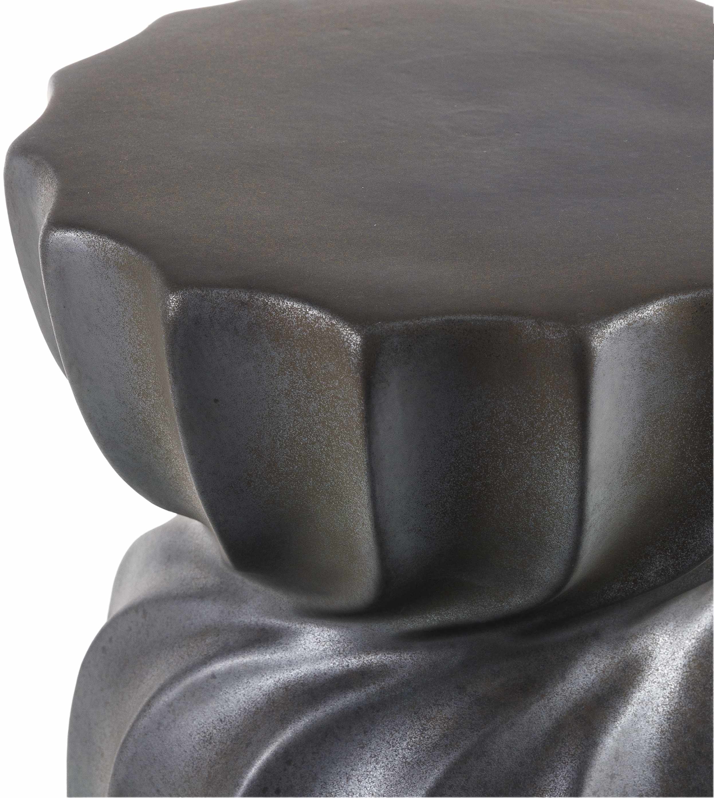 Close-up of a textured black Minimalist Modern Ceramic Stool Contemporary design sophisticated Scandinavian style on a white background