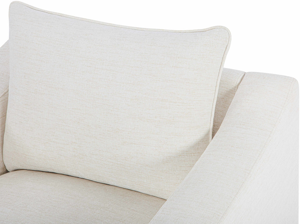 Contemporary Scandinavian-style chair, sleek minimalist seating, armchair in a room, beige accent chair with a pillow