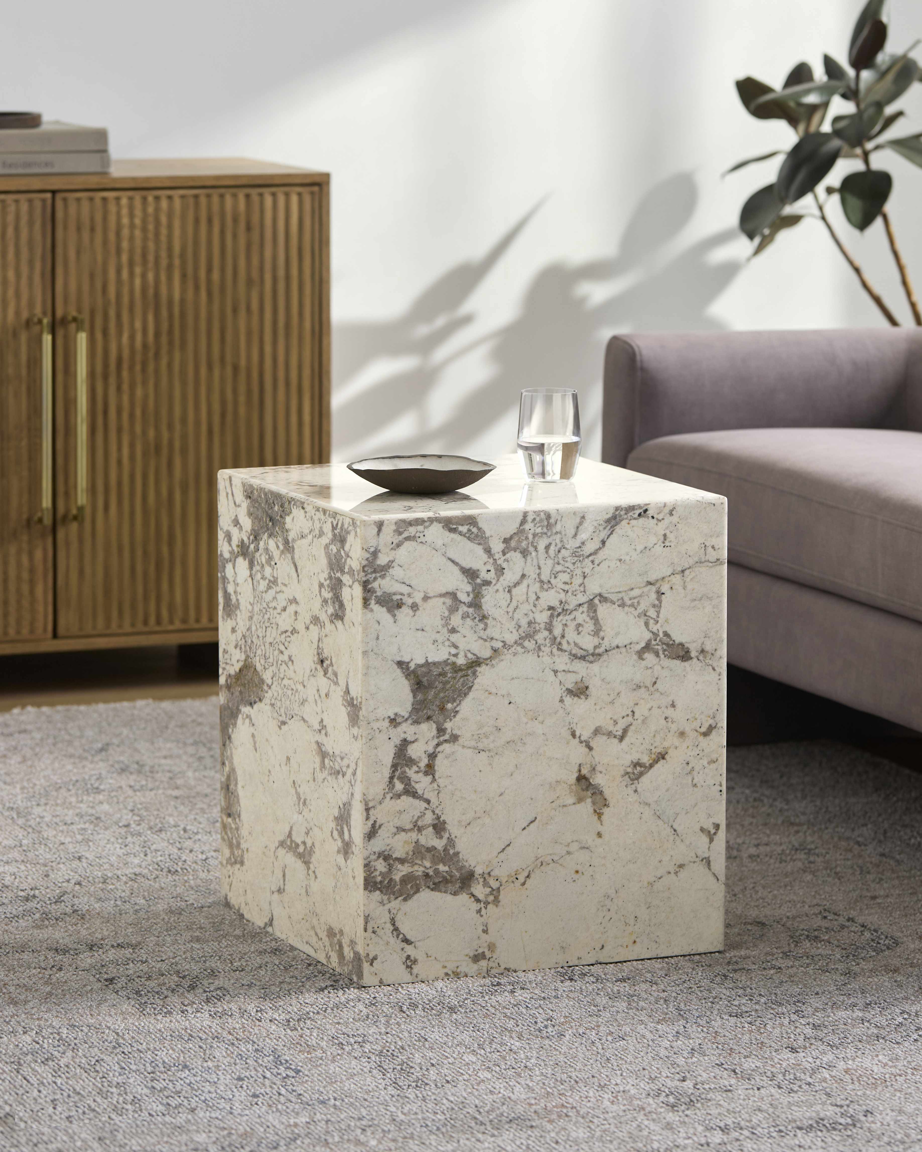 Modern granite end table with minimalist frame, sleek accent furniture Contemporary side table with natural granite surface for living room décor Minimalist end table adding sophisticated style to modern interiors