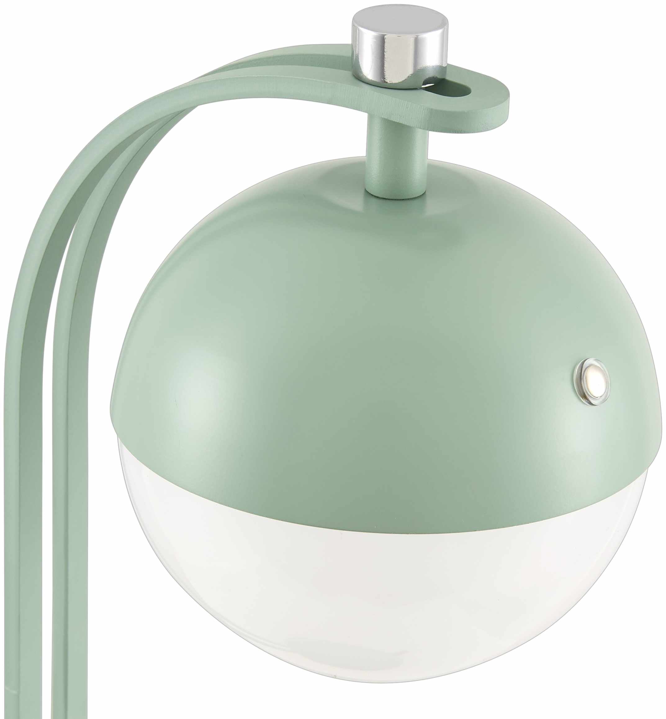 Detail view of lamp’s green iron base and white interior shade