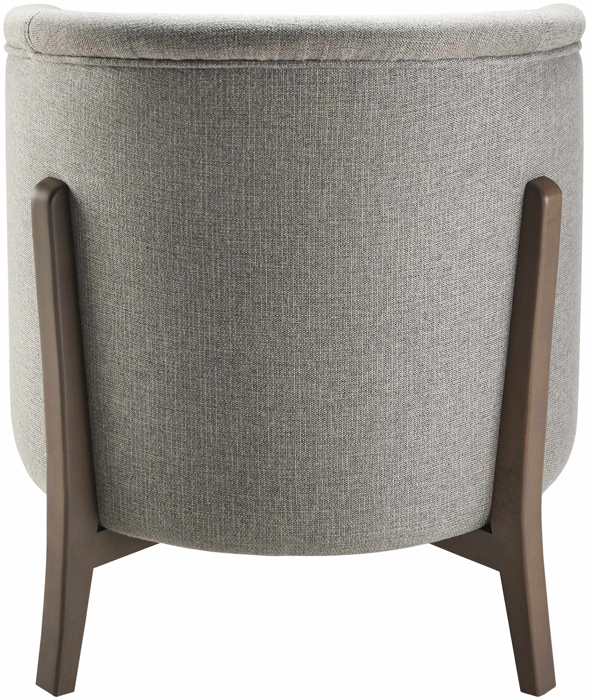 Gray upholstered armchair with wooden legs on a white background