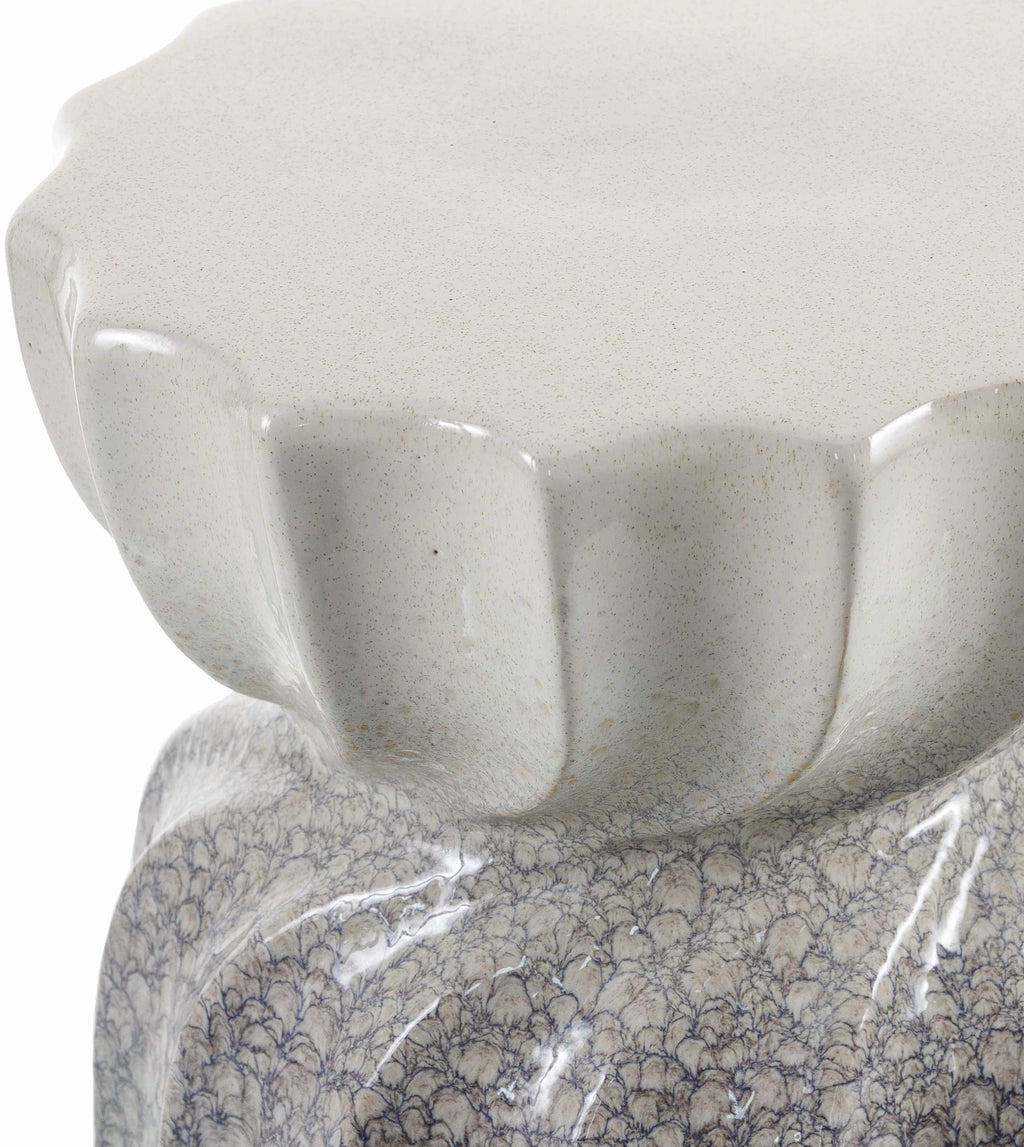 Handcrafted ceramic stool with organic textures and modern minimalist design closer look