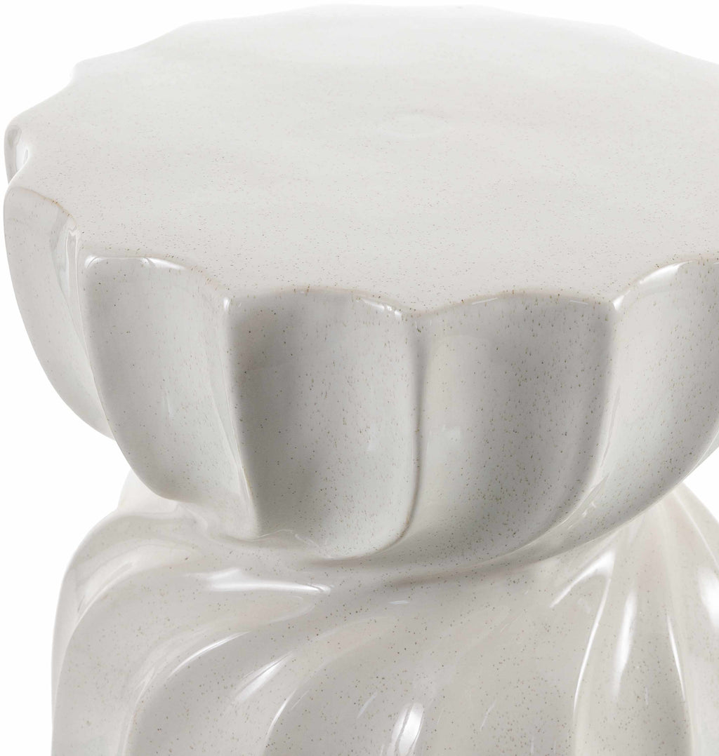 Handcrafted ceramic stool with organic textures and modern minimalist design