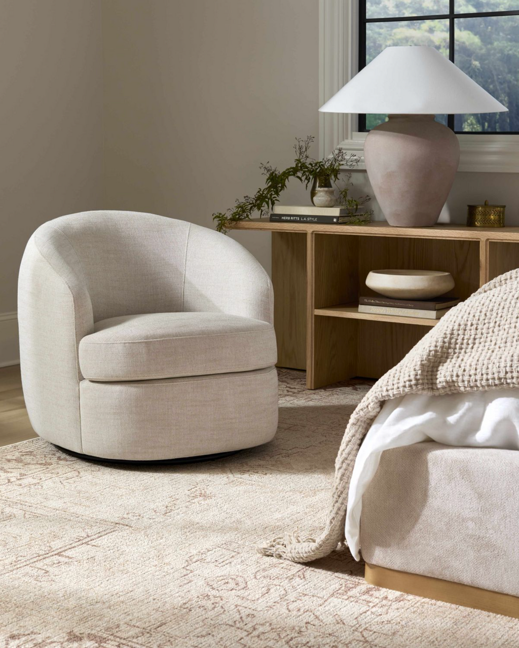 Modern accent chair with elegant curved silhouette and minimalist design scandinavian design contemporary in a bedroom 