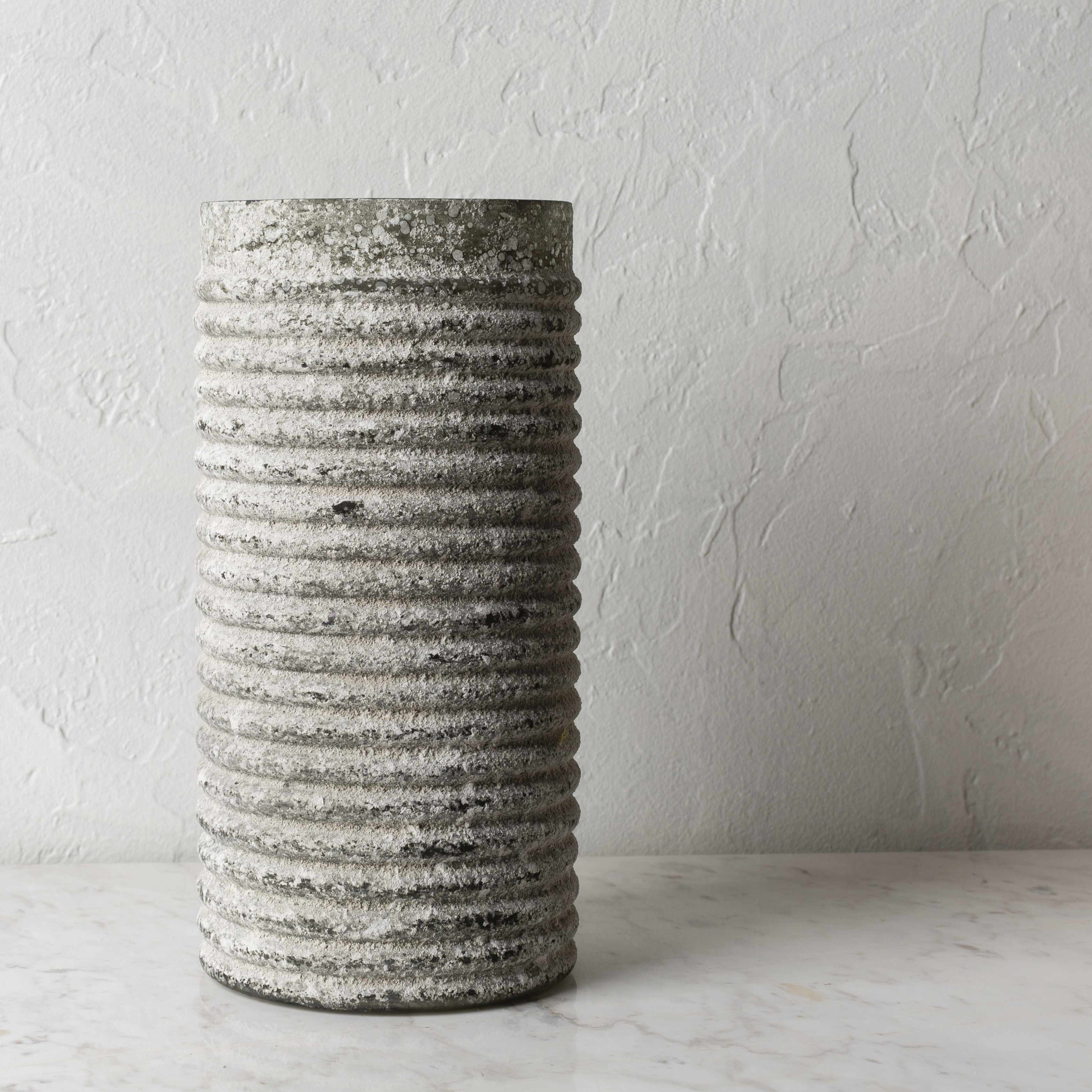 Modern  contemporary cylindrical glass vase with textured gray finish 