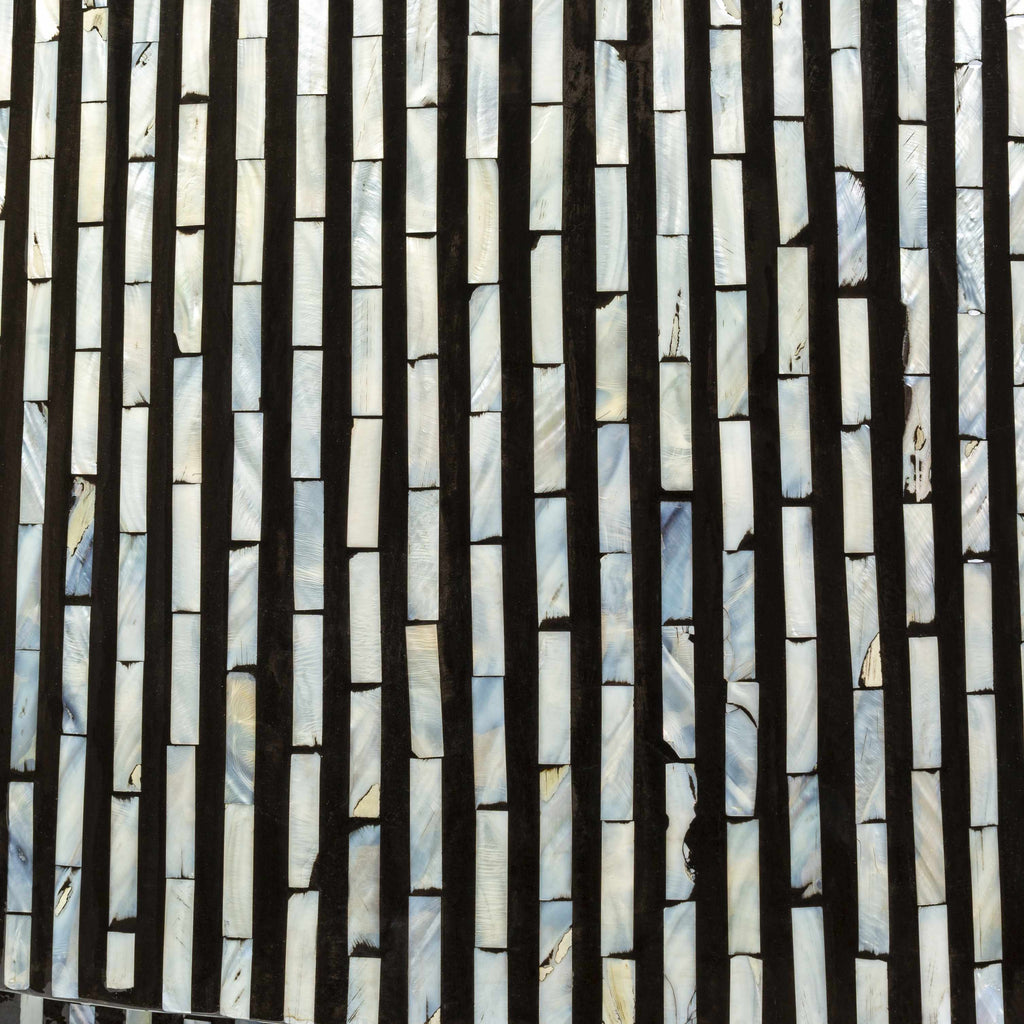 Round contemporary coffee table with black and white striped pattern closer look