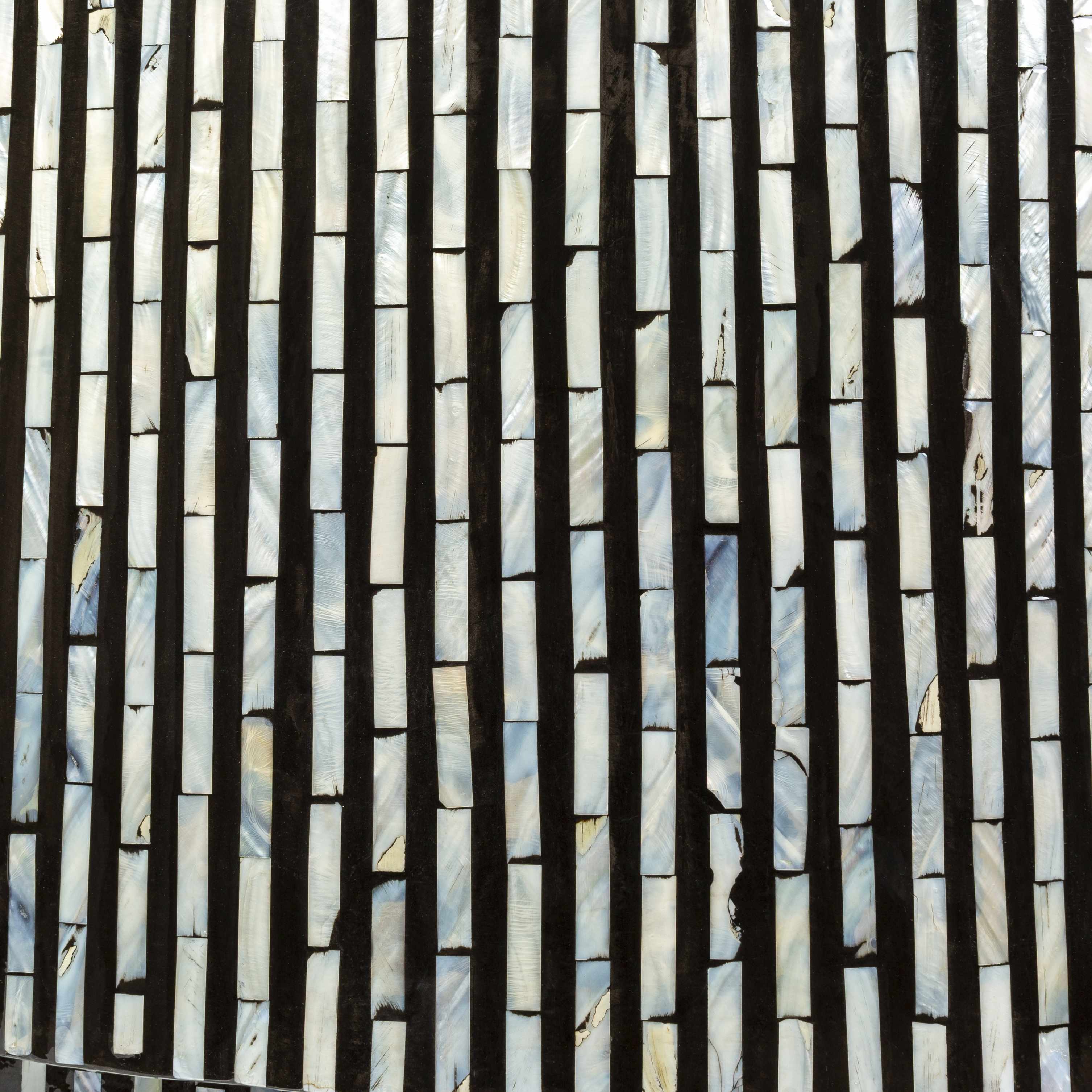 Round contemporary coffee table with black and white striped pattern closer look