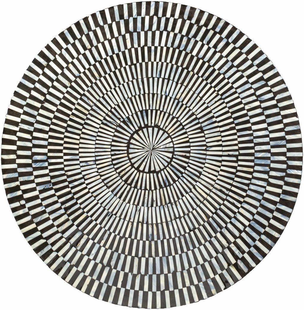 Round contemporary coffee table with black and white striped pattern from above