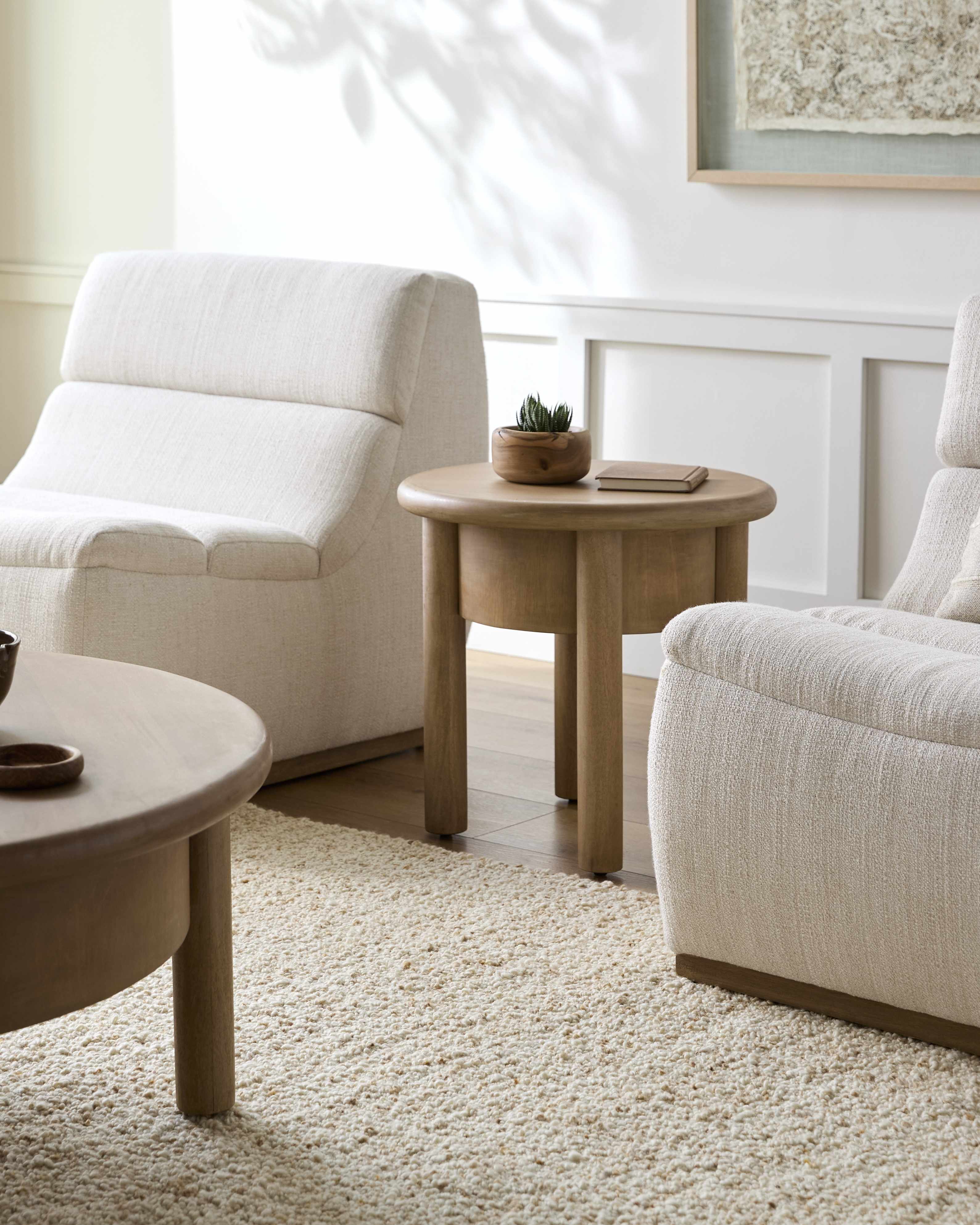 Contemporary side table crafted from solid mango wood Minimalist neutral-toned end table for modern and cozy interiors Natural wood accent table in warm beige tone for living room décor in a living room