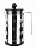 French press coffee maker with accessories on a white background